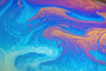 Abstract iridescent wave background. Soap bubble texture