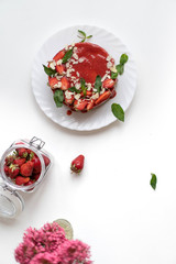 Vegan, raw food cakes with strawberries. Vegan concept.