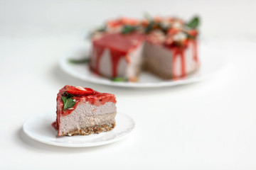 Vegan, raw food cakes with strawberries. Vegan concept.