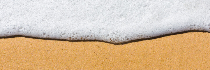 Tropical beach with panoramic views and waves, rocks and sand background. Travel destinations in Brazil and banner web.