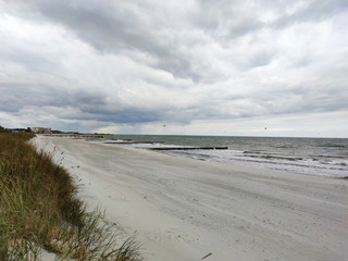 Fototapeta na wymiar Beautiful sea scene in Germany with white sand on foreground