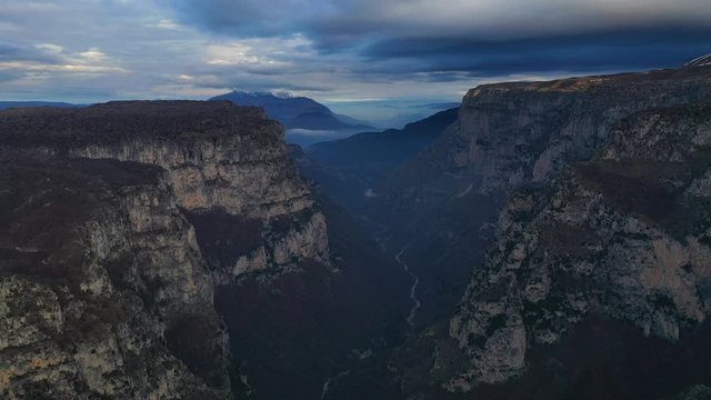 Aerial view of Vikos Gorge, a gorge in the Pindus Mountains of northern Greece at sunset time