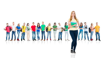 Obraz premium Large group of teenage students isolated on white background. Many different people standing together. School, education, college, university.
