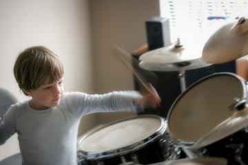 Fototapeta na wymiar Boy Playing Drums
