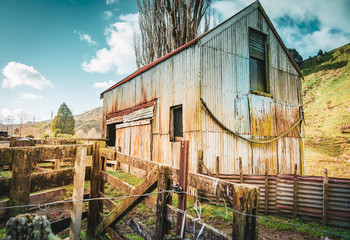 Old rural building and stock yard railings.