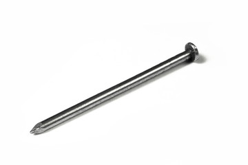 Simple metallic nail isolated on white background.