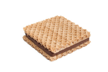 Wafer filled with milk chocolate and isolated on white background