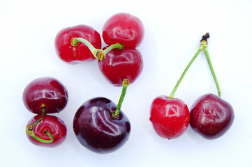 Organic cherries on white background   