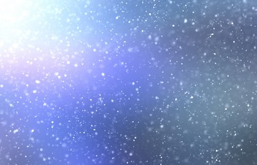 Shiny blue iridescent background decorated snow. Soft blurred pattern. Magical winter template for holiday design. 