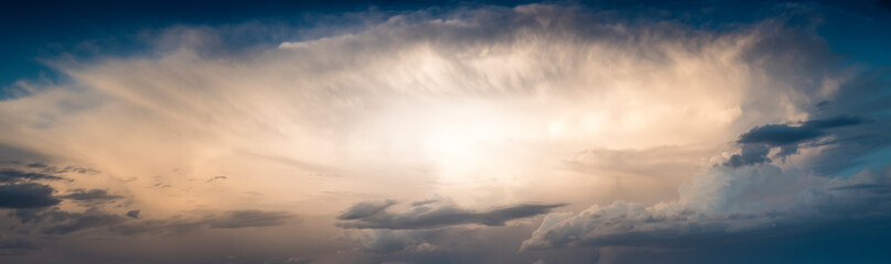 clouds in the sky making shapes and drawings with various colors