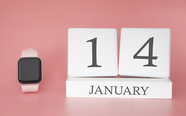 Modern Watch with cube calendar and date 14 january on pink background. Concept winter time vacation.