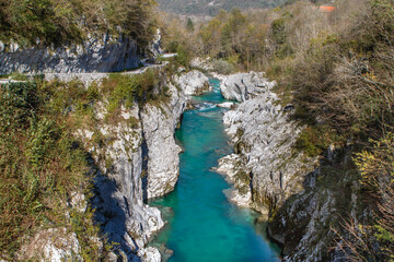 Kobarid, Slovenia - October 28, 2014: The Soca river flows through western Slovenia and its source lies in the Julian Alps. One of the most beautiful rivers in Europa, known for its emerald color.