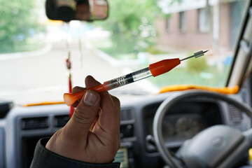dart with transparent sedative substance, injection for catching wild, stray animals, dogs without owners, humane catch
