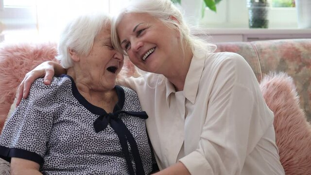 Senior woman spending quality time with her daughter
