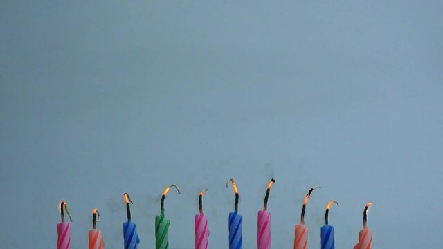 Close-up blow a candles Collection set birthday on black background.