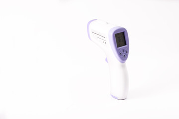 digital infrared thermometer in white background