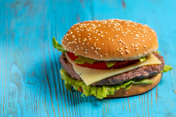 burger on a blue wooden background