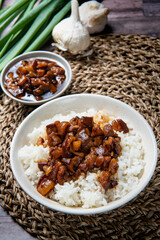 braised pork on rice is Minced pork served with pickles on top of steamed rice