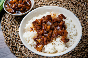 braised pork on rice is Minced pork served with pickles on top of steamed rice