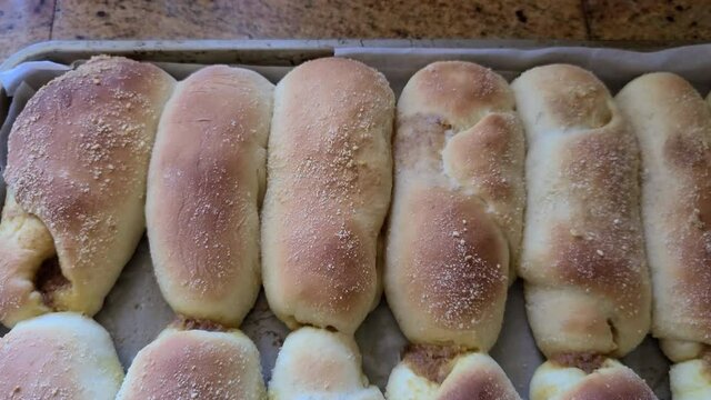 Hot filipino snack spanish bread in a pan.