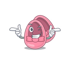 Cartoon design of baby girl shoes showing funny face with wink eye