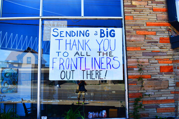 Thank you to front line workers sign on store front 