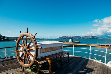 Ship's Steering wheel on historic ship on Hyde street pier, San Francisco, California