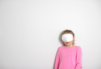 Young Girls with face masks on a white background with room for text or whitespace. Sisters acting...