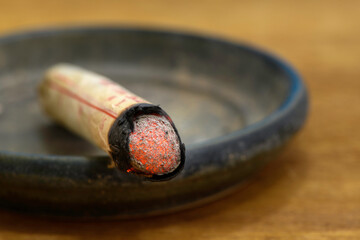 Burning moxa stick from chinese medicine treatment 