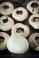 Hats of champignon mushrooms