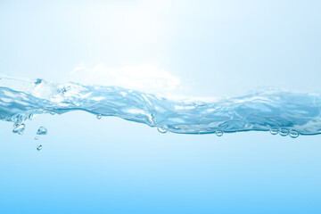 Water splash. Aqua flowing in waves and creating bubbles. Drops on the water surface feel fresh and...