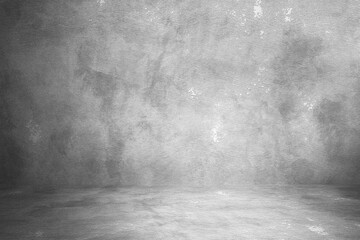 Black concrete background wall. Old surfaces that have scratches and cracks. Black room.