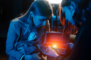 Woman and woman fortune teller with crystal ball