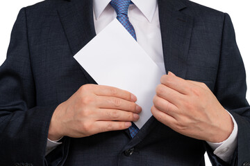Businessman holding a white envelope in his hand.
