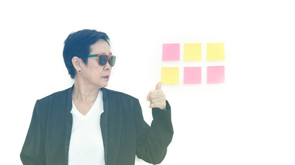 Stress facial expression Asian senior businesswoman dealing with problems at work