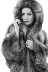 Winter beautiful Woman in Fur Coat. Beauty Fashion Model Girl.