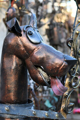 Head figure of funny forged metal dog 