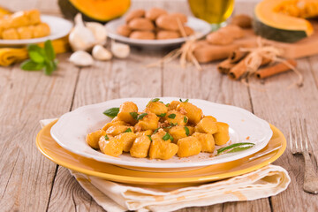 Pumpkin gnocchi with grated amaretti cookies.
