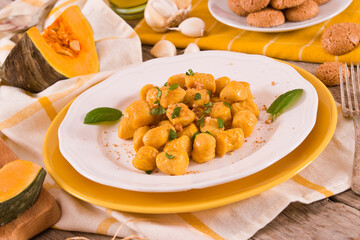 Pumpkin gnocchi with grated amaretti cookies.
