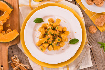 Pumpkin gnocchi with grated amaretti cookies.
