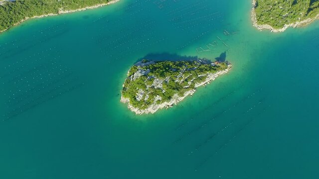 Aerial shot of beautiful island amidst blue sea - Ston, Croatia