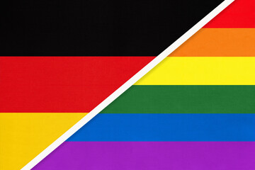Federal Republic of Germany national fabric flag and rainbow flag of LGBT community from textile.
