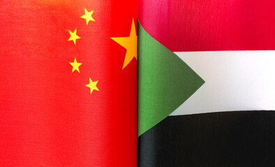 fragments of the national flags of China and the Republic of Sudan close up