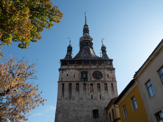 Obraz premium Sighisoara clock tower in Transylvania, landmark of the city. The tower is the main entry point to the citadel, now inside the tower is a museum of history.