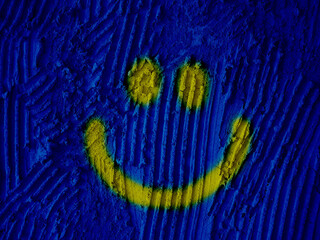 Abstract Blue  cement background and Yellow smile symbol.