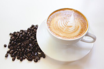 cup of coffee with beans