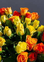 bouquet of yellow and pink roses.