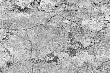 Texture of a concrete wall with cracks and scratches which can be used as a background