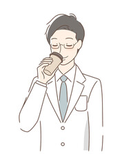 テイクアウトのコーヒーを飲む男性