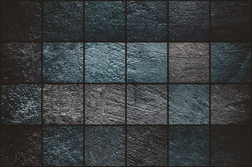 Horizontal grunge background consisting of squares of different textures and shades. Beautiful textured wall background. Blue, turquoise and purple tones. Abstract cube pattern. Color of the year 2020
